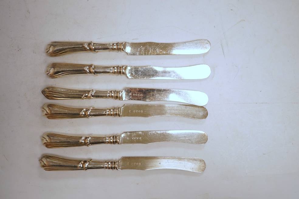 A set of six Victorian silver bladed dessert knives with loaded silver handles, by Lias & Lias, London, 1871, 21cm.